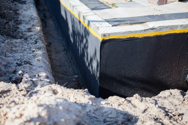 Professional Interior Drainage System technician working in Chester, VA
